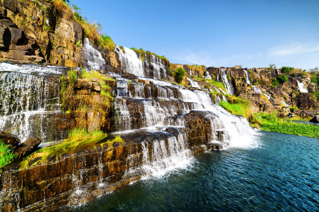 Amazing natural cascades of waterfall with crystal clear water